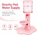 Pink pet water fountain with a clear water bottle on a pink stand and bowl, shown with marketing text reading 'Gravity-Fed Water Supply' and icons for 'No Electricity', 'No Pump', and 'No Noise'.